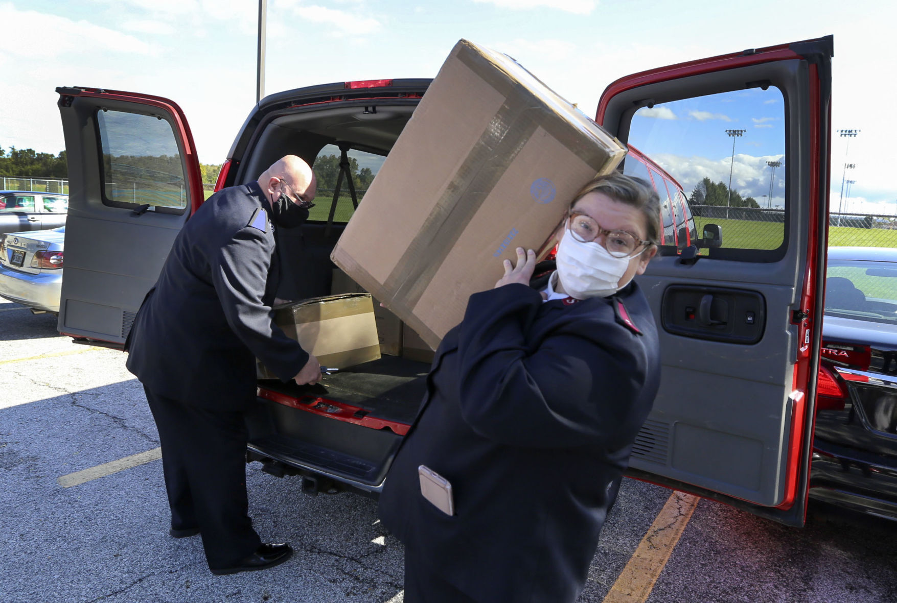 Scores of masks, cleaners donated to area schools